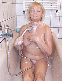 Blonde housewife taking a kinky shower